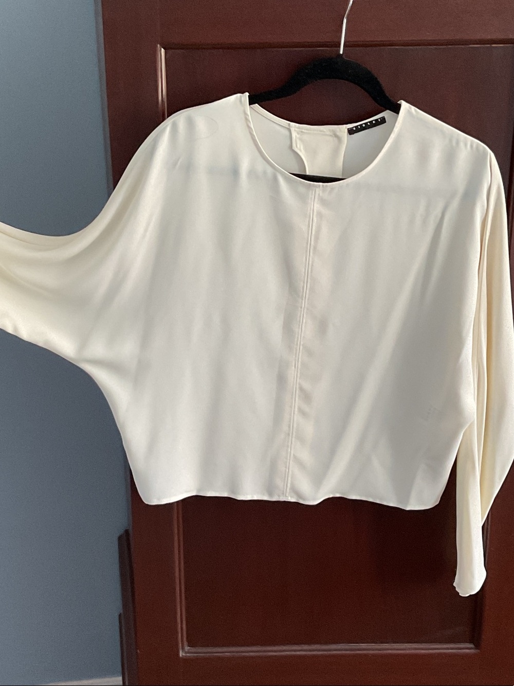 Off white light blouse, size medium, never been worn. Sisley.